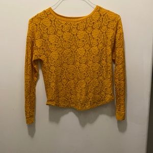 yellow lace detail shirt with tank top underneath